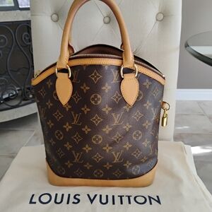 Authentic Louis Vuitton Lock It Handbag